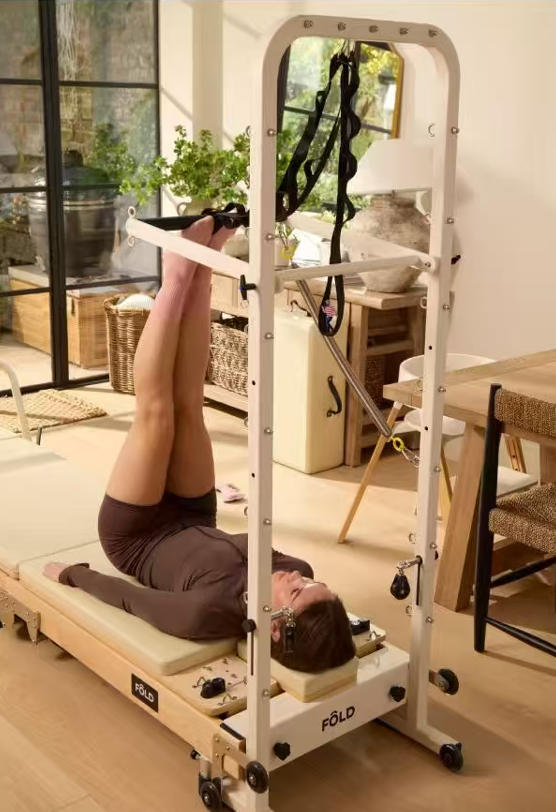 Reformador de pilates plegable con torre en casa..jpeg Reformador de pilates plegable con torre en casa..jpeg